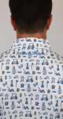 Back view of a man wearing a white button-down shirt with  blue Dad golf-themed pattern, featuring golf carts, clubs, flags, and a cursive 'Mulligan Hooligan' script on the collar.