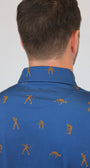 Close-up of a man wearing a blue collared shirt with a repeating brown Golfing Bigfoot figure print, and 'Mulligan Hooligan' Writing on the back, photographed against a plain light background. 