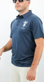 Man wearing a blue polo shirt with a graphic design and text, holding a golf club.