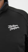 Black jacket with 'Multllgan Hoolllgan' logo on a white background
