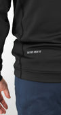 Black Q-Zip with 'Bad Shot. Great Fit' text on a white background